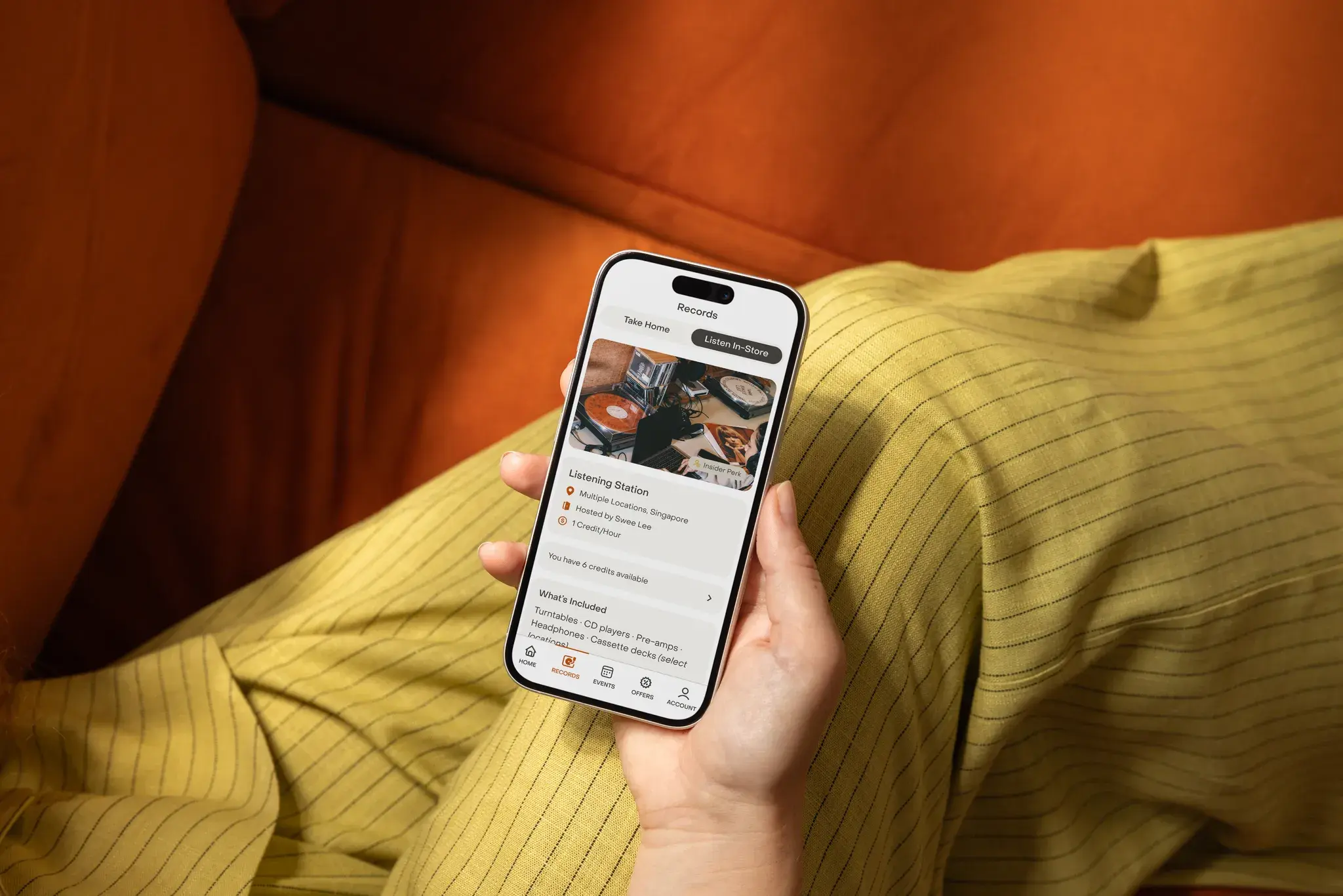 A person using the VMI Connect app on a phone