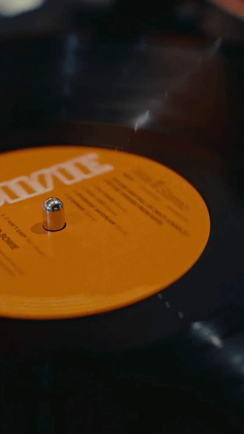 A vinyl record playing on a turntable